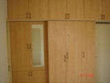 WARDROBE WITH LAMINATED SHUTTERS