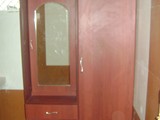 WARDROBE WITH POST FORMED SHUTTER